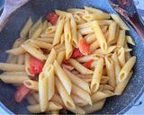 Foto del passaggio 6 della ricetta Pasta con pomodorini e zucchine