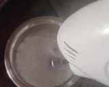 A picture of step 5 of Mango malpua with fresh cream.