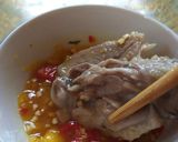 A picture of step 8 of Duck Congee with Duck Salad.