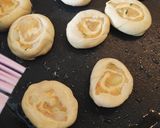 A picture of step 6 of Savoury Pin Wheels 😋.