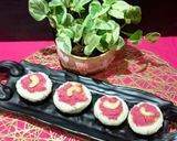 A picture of step 6 of Beetroot Coconut open Bhapa Pitha.