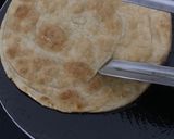 A picture of step 10 of Tawa chicken chutney roll.