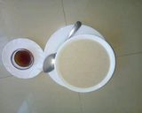 A picture of step 5 of Ground nuts, Cassava, Yam and Arrow root 'soup' porridge.