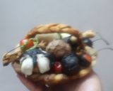 A picture of step 9 of CHOCO BASKET(a basket full of choclates).