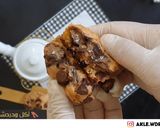 صورة لخطوة 7 من وصفة الكوكيز الطري محشي شيكولاتة بنكهات جديدة والطعم مفاجأة