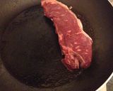 A picture of step 1 of Dry aged sirloin, green salad, horseradish dressing.