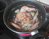 Foto del paso 2 de la receta: Arroz con pulpo, langostinos y mejillones
