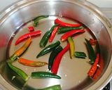 A picture of step 1 of Extra Hot Chilli sauce / schezwan sauce/ Pilipili ya Kukaanga.