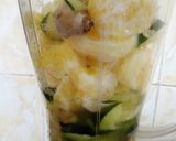 A picture of step 2 of Cucumber ginger and orange juice.