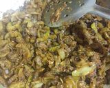 A picture of step 11 of Karela Pyaz.