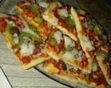 صورة لخطوة 2 من وصفة بيتزا🍕