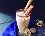 A picture of step 18 of Choco vermicelli mocktail with cocoa cubes.