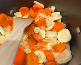 A picture of step 2 of Warming Carrot & Parsnip Soup 🥕.