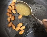 A picture of step 3 of Honey Glazed Almonds.