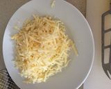 A picture of step 4 of Cauliflower Cheese with Bacon bits.