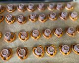 A picture of step 2 of Rolo and Pretzels Christmas treats.