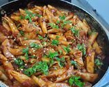 A picture of step 6 of Red sauce pasta.
