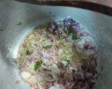 A picture of step 1 of Cauliflower with green peas and carrot potato.