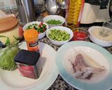 A picture of step 1 of Paella with Fresh Fava Beans and Pods.
