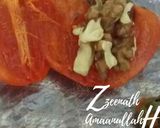 A picture of step 2 of Frozen Persimmons with stuffed Walnuts.