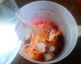 Foto langkah ke 1 dari resep Es Blewah Campur Cincau & Selasih.