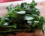 A picture of step 1 of Common purslane with chicken and rice.