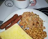 A picture of step 6 of Toasted Bread, Egg with Sardine Sauce, Baked Beans with Sausage.