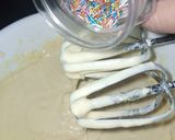 A picture of step 7 of Rainbow Marble Cake.