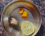 A picture of step 2 of Raw turmeric and Ginger kaadha.