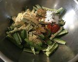 A picture of step 2 of Bhindi Kurkuri.