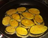 A picture of step 2 of Coated eggplant fries.