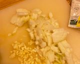 A picture of step 2 of Chicken and mushroom baked rice.