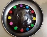 A picture of step 4 of Vanilla cake with chocolate ganache.