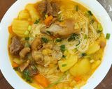 Hình bước làm 3 của món Canh móng giò, bắp bò nấu khoai tây, cà rốt