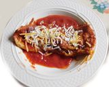 A picture of step 6 of Mexican Enchilada With black bean, cheese, black olives and etc. Stuffing.