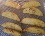 Foto del paso 3 de la receta: Papas gajo especiadas en freidora de aire