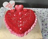 A picture of step 11 of Heart shape red velvet cake.