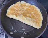 A picture of step 9 of Omurice (Japanese omelette rice).
