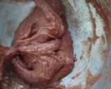 A picture of step 3 of Ragi mudda with mutton curry.