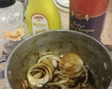 Foto del paso 4 de la receta: Pescado asado sobre anillas de cebollas en miel