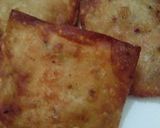 A picture of step 6 of Creamy cheesy parcels.