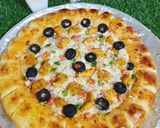 A picture of step 6 of Cheesy Bites Tikka Pizza 🍕🍕.