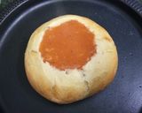 A picture of step 13 of Bread Bowl with Tomato & Sweet Potato Soup.