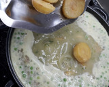 Foto del paso 8 de la receta: Filetes de merluza, patatas y guisantes en salsa verde