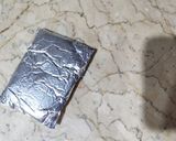 A picture of step 2 of Buttery Garlic Foil Pack.