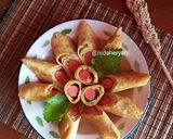 Foto langkah ke 6 dari resep Telur Dadar Gulung Sosis.
