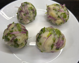 A picture of step 2 of Aloo pitika.