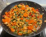 A picture of step 26 of Chicken with Cashews, Bell Peppers, and Carrots.