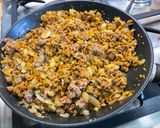 A picture of step 15 of Beef, Spice, and Vegetable Stuffed Eggplants.
