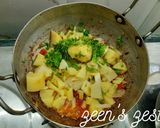 A picture of step 2 of Khopra Masala Aloo or Potatoes with Dry Coconut.